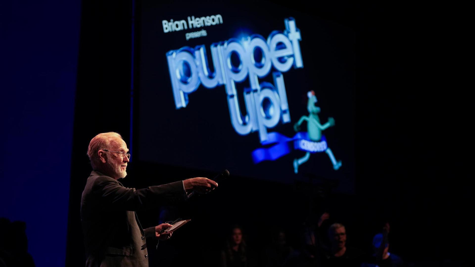 MC introducing the play Puppet Up
