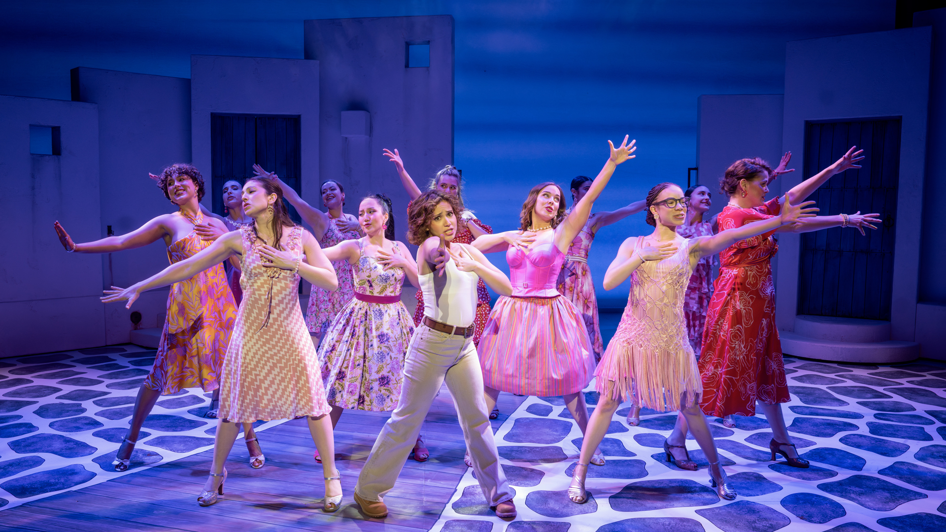 Production cast on stage in MAMMA MIA! Photo by Joan Marcus