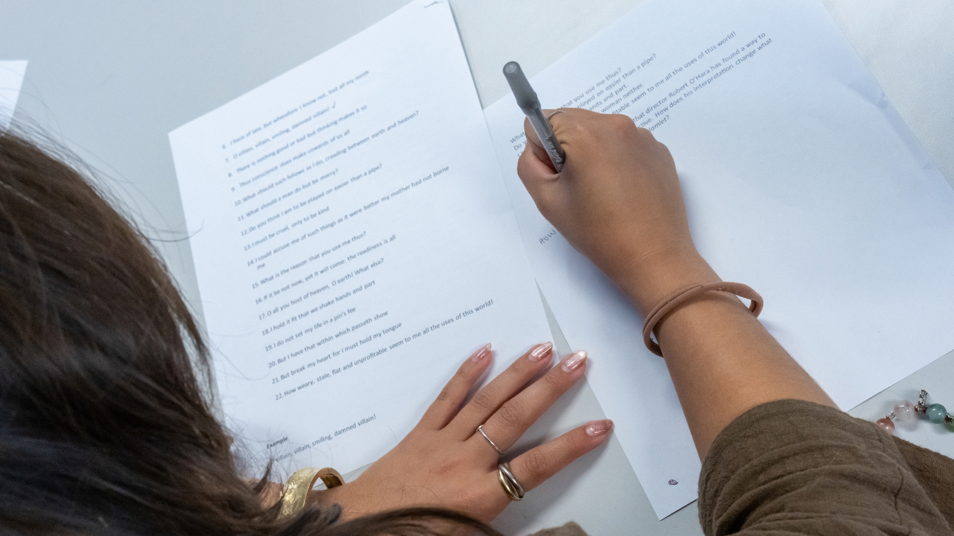 person writing on paper